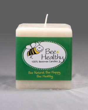 White beeswax candle with bee logo.