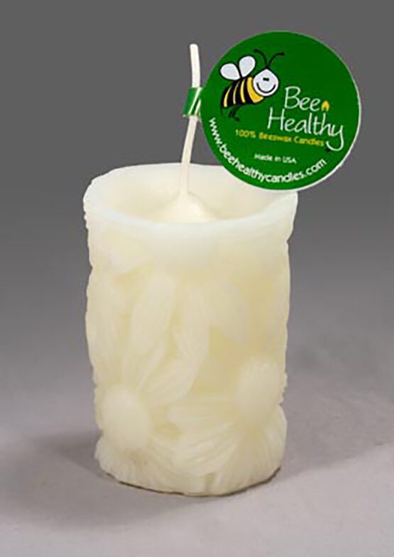 A Daisy Pillar - White beeswax candle with a bee on it.