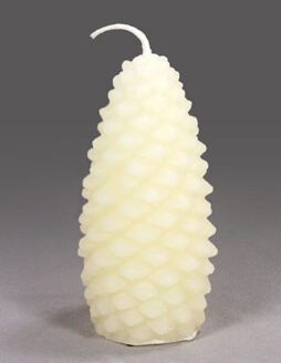 A large white pinecone shaped candle