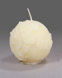 A white Small Pine Cone - White beeswax with a white flower on it.