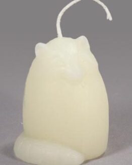A small pine cone - white beeswax candle with a fox on it.