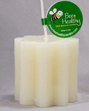 White beeswax candle in star shape.