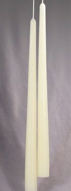 Two long, white, taper candles.