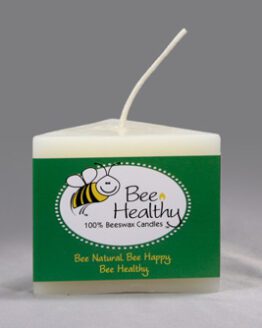 A 3"x6" Twisted Octagonal Pillar - White beeswax candle on a white background.