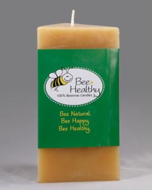 Bee Healthy beeswax candle with bee logo.