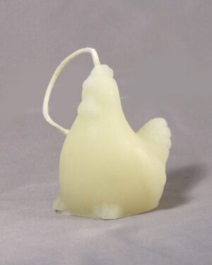 White chicken shaped candle with wick.