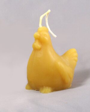 Yellow beeswax chicken shaped candle.