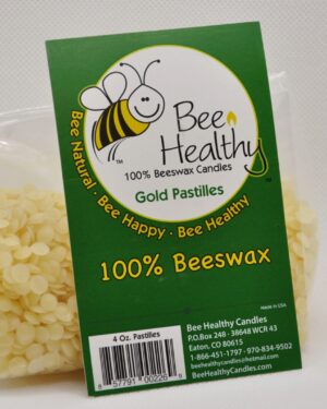 Bag of gold beeswax pastilles for candles.