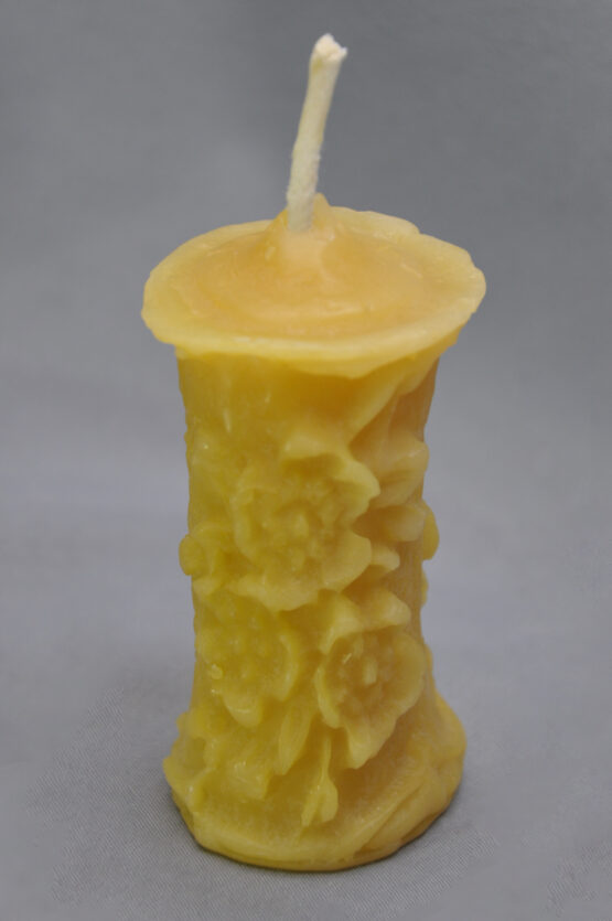 small flower pillar candle in gold beeswax